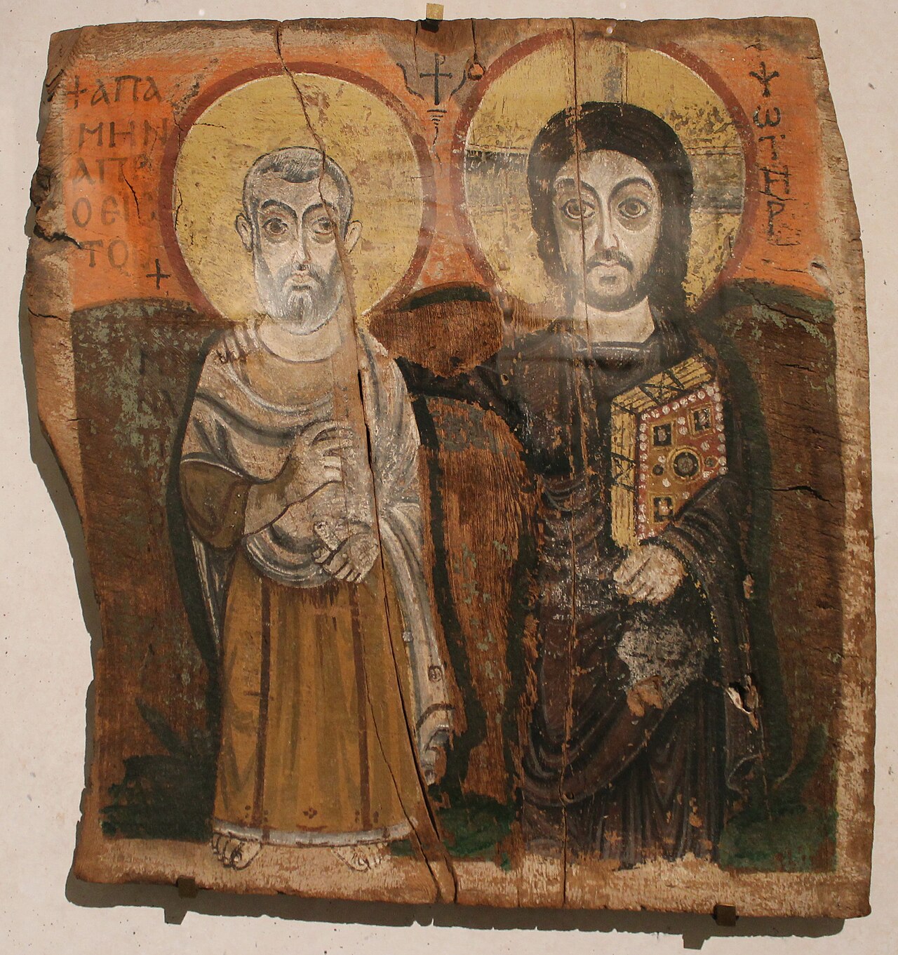Christ and Abbot Menas — 6th-century Coptic icon from Bawit, Egypt. One of the earliest surviving icons, depicting the friendship between Christ and a desert monk